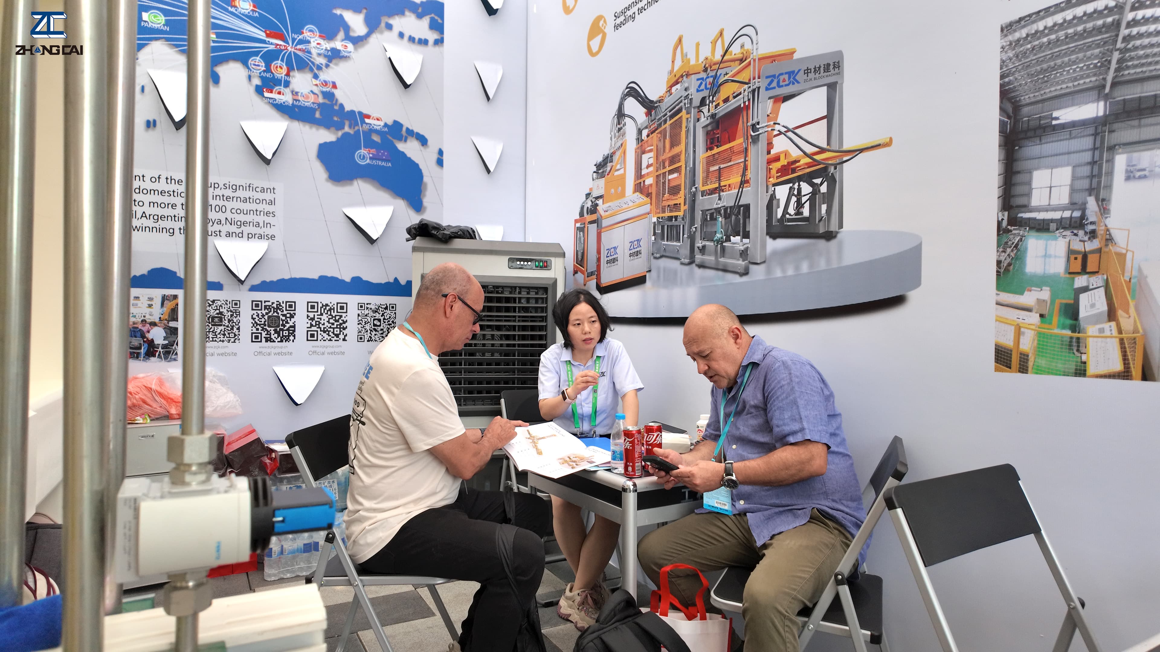 Our team in active discussion with clients at the ZCJK booth.